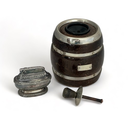 292 - A mid 20th Century Dorset Light Industries wooden barrel flintless table lighter. Offered together w... 