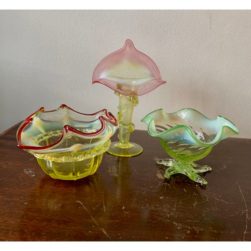 281 - Victorian “ Uranium “ glassware, three pieces of flowered glass vases to include a Jack in the Pulpi... 