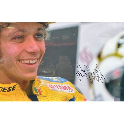 421 - Framed signed Valentino Rossi close up picture. Large picture with plaque to bottom of frame. Descri... 