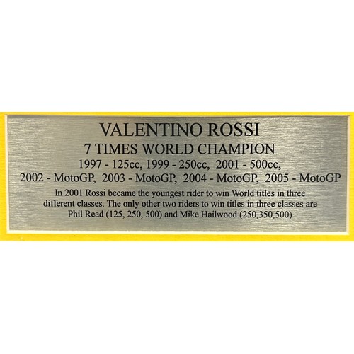 420 - Framed Valentino Rossi commemorative picture. 5 images of Valentino Rossi with short bio celebrating... 