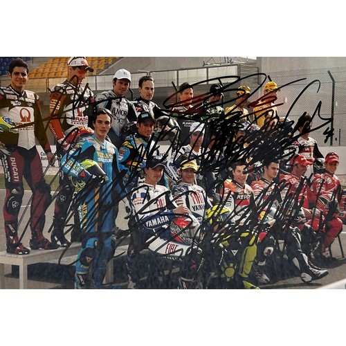 432 - Framed signed 2007 MotoGP riders picture. Featuring the signatures of 16 riders from the 2007 season... 