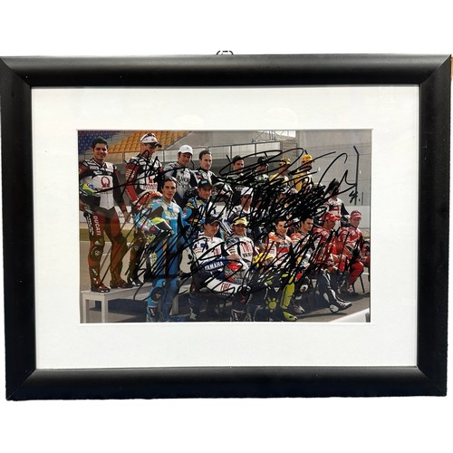 432 - Framed signed 2007 MotoGP riders picture. Featuring the signatures of 16 riders from the 2007 season... 