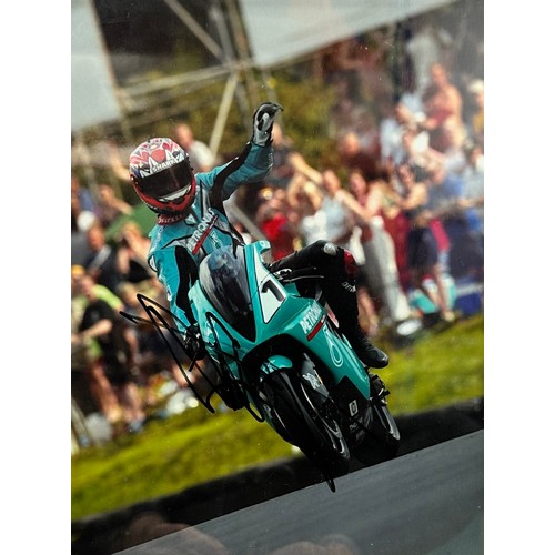 436 - Framed signed Carl Fogarty picture. Carl Fogarty pictured on a Petronas FP1 motorbike. This was the ... 