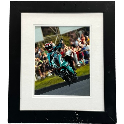 436 - Framed signed Carl Fogarty picture. Carl Fogarty pictured on a Petronas FP1 motorbike. This was the ... 