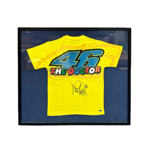 446 - Framed signed Valentino Rossi shirt. Rossi's famous '46 The Doctor' yellow t-shirt. COA label from S... 