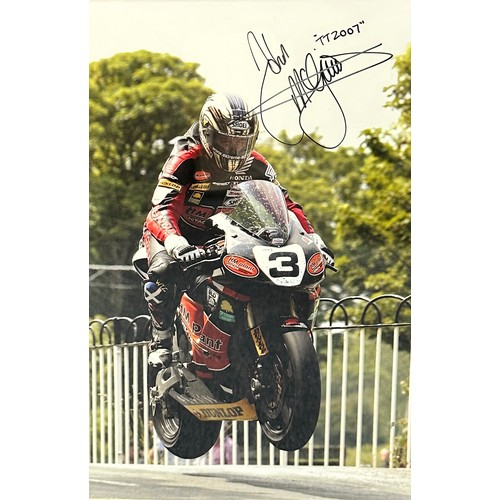 444 - Framed signed John McGuinnes picture. McGuinnes is a Isle of Man TT race legend. No COA, frame dimen... 