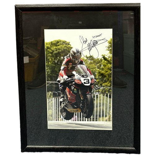 444 - Framed signed John McGuinnes picture. McGuinnes is a Isle of Man TT race legend. No COA, frame dimen... 