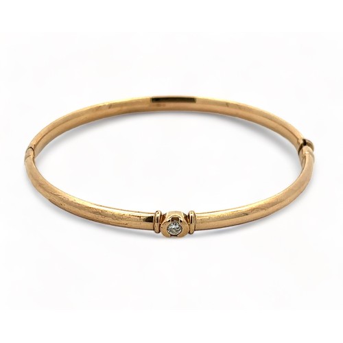 13 - Three 9ct gold and diamond bangles. 

Please see the buyer's terms and conditions for purchasing dia... 