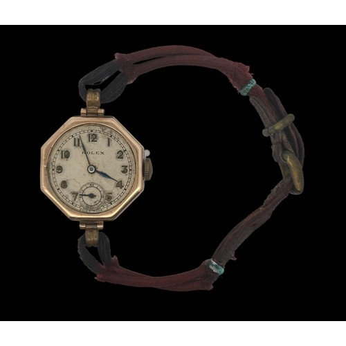 67 - Rolex - an octagonal 9ct gold Rolex watch, circa 1940. 15 rubies, Arabic numerals, subsidiary dial, ... 