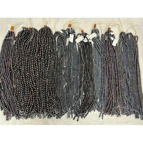 61 - A large quantity of cultured pearl strands for jewellery making. Pearl sizes and shapes vary.  Colou... 