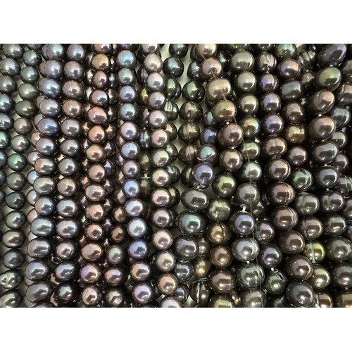 61 - A large quantity of cultured pearl strands for jewellery making. Pearl sizes and shapes vary.  Colou... 