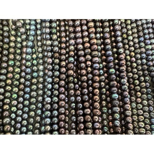 61 - A large quantity of cultured pearl strands for jewellery making. Pearl sizes and shapes vary.  Colou... 