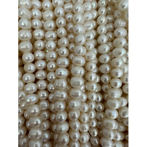 60 - A large quantity of cultured pearl strands (approx 165) for jewellery making. Pearl sizes and shapes... 