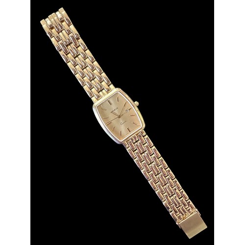 74A - Geneve, a 14k gold wristwatch, gold coloured rectangular dial with gold coloured batons and hands, c... 