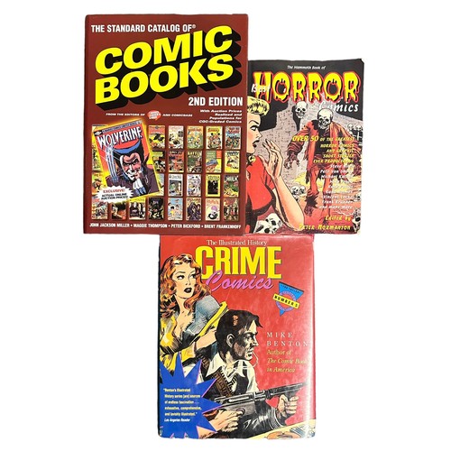 516 - Miscellaneous collection of hardback books on comics. Books are The standard catalog of comic books ... 