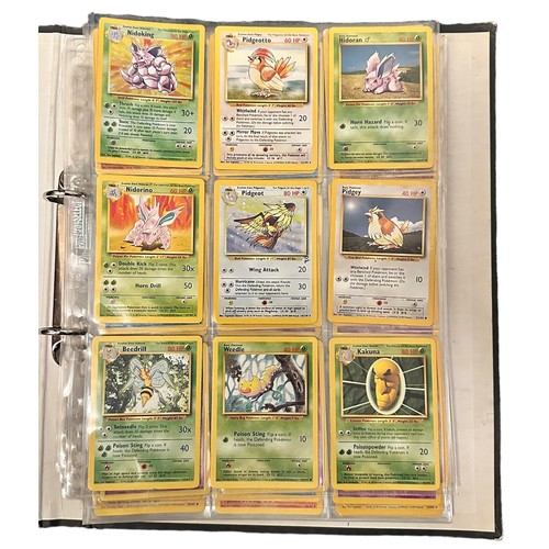 415 - A folder containing 152 Pokemon cards from 1999 Base Set, Jungle and Base Set 2. Including a Holo Ch... 