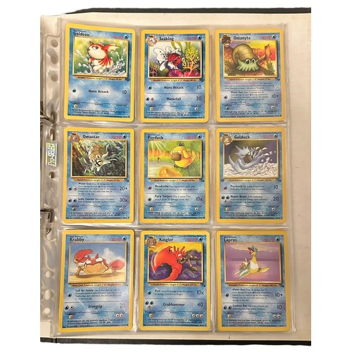 415 - A folder containing 152 Pokemon cards from 1999 Base Set, Jungle and Base Set 2. Including a Holo Ch... 