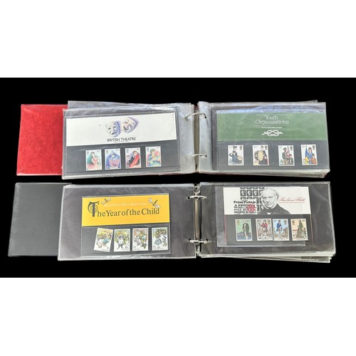 311 - Presentation packs 1973 to 2003 in 4 volumes. Face value £324