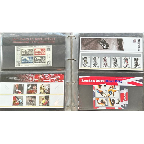 313 - UM collection of sleeveless commemorative presentation packs in 2 binders and loose from 1997-2007. ... 