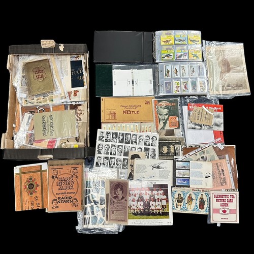 412 - Large accumulation of trade cards (some cigarette cards) in 3 fruit trays with 3 sleeved album and l... 