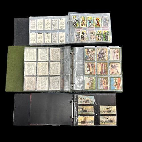 412 - Large accumulation of trade cards (some cigarette cards) in 3 fruit trays with 3 sleeved album and l... 