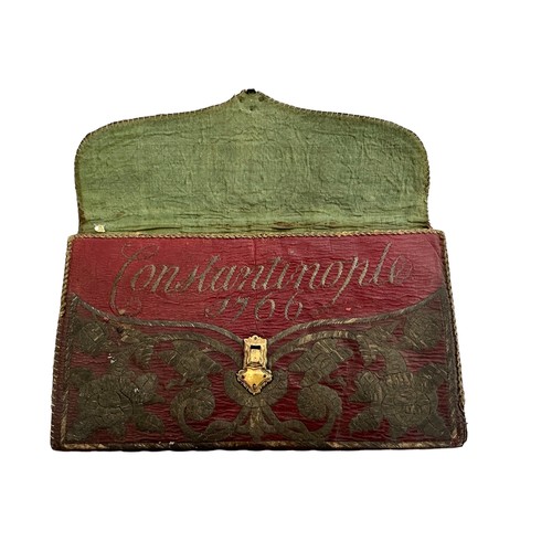 188 - Ottoman metal-thread embroidered leather wallet. The rectangular wallet with gilt clasp is embroider... 