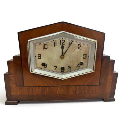 198 - A large Art Deco style Mantel Clock by Dimra in a rosewood case. Small patch on case where veneer ha... 