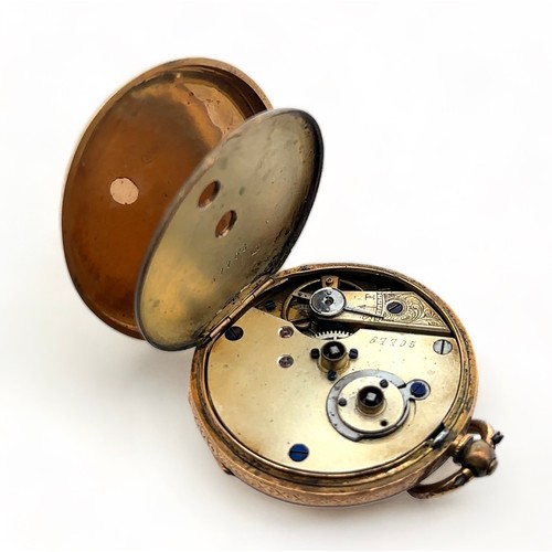 147 - A ladies 18ct gold pocket watch. Gold dial with Roman numeral markers, case diameter 37mm. Stamped K... 