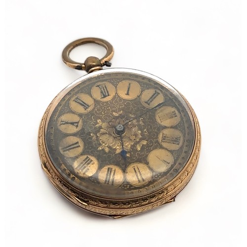 147 - A ladies 18ct gold pocket watch. Gold dial with Roman numeral markers, case diameter 37mm. Stamped K... 