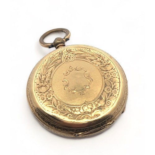 147 - A ladies 18ct gold pocket watch. Gold dial with Roman numeral markers, case diameter 37mm. Stamped K... 