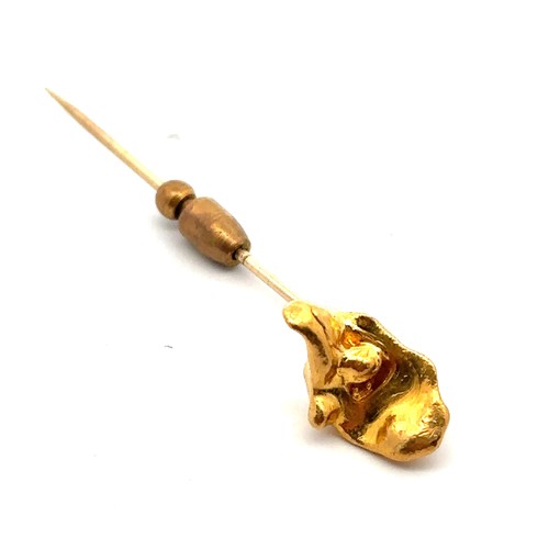 2 - A gold nugget pin. Nugget tested using XRF as 24ct gold, pin tests as 9ct gold. Length 56mm,  5.93g.... 