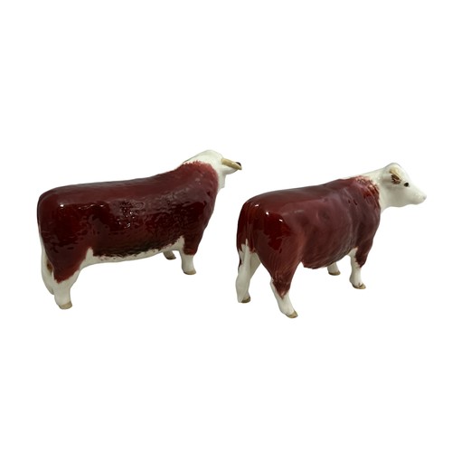 251 - Beswick Hereford bull and cow - Champion of Champions (2), heights 11cm, bull is second version with... 