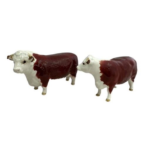 251 - Beswick Hereford bull and cow - Champion of Champions (2), heights 11cm, bull is second version with... 