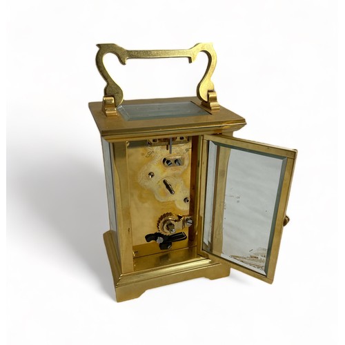 199 - Garrard & Co, 20th Century brass carriage clock by Garrad & Co, London W1. Four glass panels with fo... 