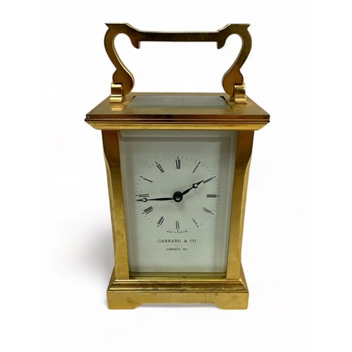 199 - Garrard & Co, 20th Century brass carriage clock by Garrad & Co, London W1. Four glass panels with fo... 