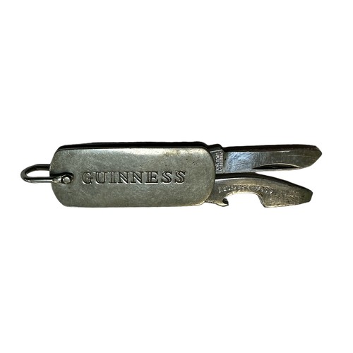 206 - Guinness, vintage Guinness pen knife / bottle opener with fold out twin tool action and hoop to be a... 