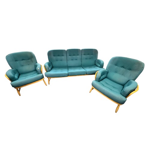 436 - A three piece Ercol lounge suite to include a sofa and two armchairs (3)