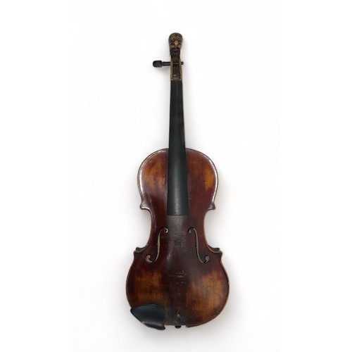 375 - An Antonius Stradivarius Violin Copy - labelled inside '1763'. Lion carved scroll. Pegbox/scroll in ... 