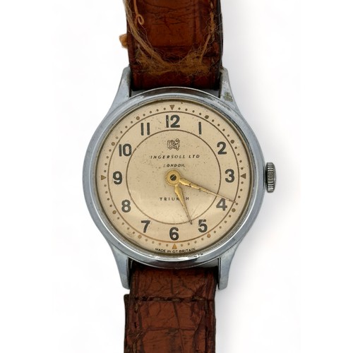 75 - An Ingersoll Ltd London Triumph Wristwatch on a brown leather strap. Gold coloured dial and hands, w... 