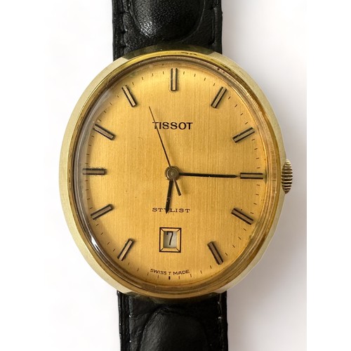 92 - A Tissot stylist gold plated mechanical wristwatch. Oval champage dial with baton hour markers and d... 