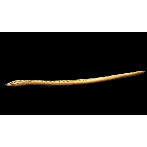 323 - Four Aboriginal Carved Wooden Snakes: The first 92cm in length decorated with poker work dashes and ... 