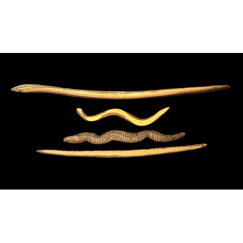 323 - Four Aboriginal Carved Wooden Snakes: The first 92cm in length decorated with poker work dashes and ... 