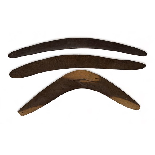 332 - Aboriginal Boomerangs. Three Boomerangs the largest of which is 75cm x 6cm with incised markings the... 