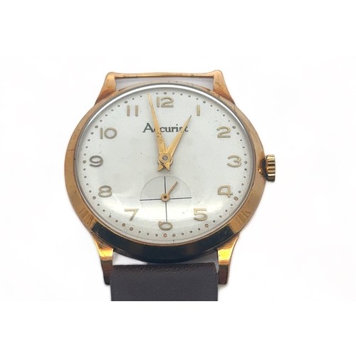 102 - A 1950s Accurist 9ct gold gents manual wristwatch.  Off-white dial with gold Arabic numerals and sub... 