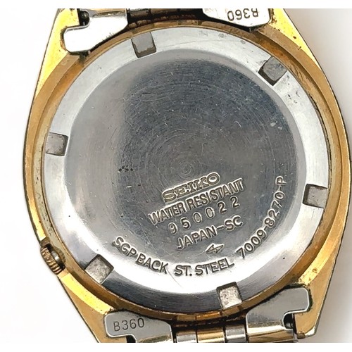 109 - A 1970s Seiko 1 jewel automatic gold plated watch with gold toned dial, baton hour markers and day/ ... 