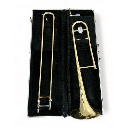 373 - A Besson 600 Trombone by Boosey & Hawkes London in a Hardback fitted case. Come with a Denis. Wick. ... 