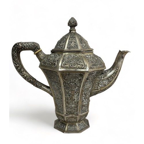 182 - A German continental silver coffee pot decorated in an ornate style. Stamped 800 to base. 834g.