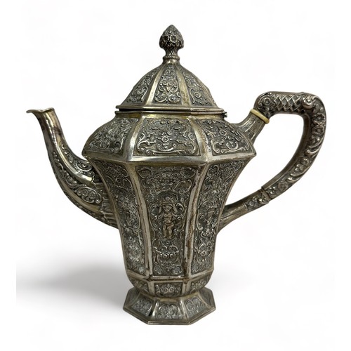 182 - A German continental silver coffee pot decorated in an ornate style. Stamped 800 to base. 834g.