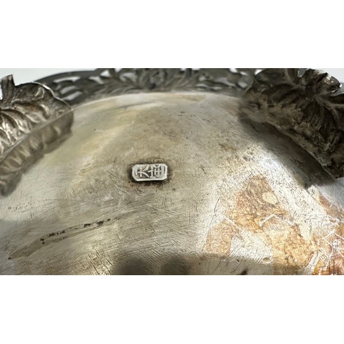 179 - A Chinese silver basket with floral pierced decoration. Diameter 22.2cm. 321g.