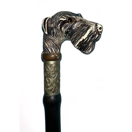 344 - Ebonised sword stick with a dogs head, possibly a terrier, dog has a brass collar with buckle. Very ... 